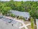 Aerial view of condo with parking and a lovely community feel with mature trees at 642 N Jefferson Ave # 13, Sarasota, FL 34237