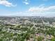 Gorgeous aerial perspective revealing the proximity to the city, surrounded by abundant green trees at 642 N Jefferson Ave # 13, Sarasota, FL 34237