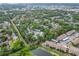 Extensive aerial view of the community, showcasing its lush surroundings and proximity to nearby amenities at 642 N Jefferson Ave # 13, Sarasota, FL 34237