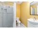 Bathroom featuring a walk-in shower with pebble flooring and modern fixtures at 642 N Jefferson Ave # 13, Sarasota, FL 34237