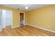 Bedroom with en suite bathroom featuring hardwood floors and a bright, open feel at 642 N Jefferson Ave # 13, Sarasota, FL 34237