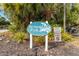 Welcome to Bermuda Park! Entrance sign surrounded by mature palm trees at 642 N Jefferson Ave # 13, Sarasota, FL 34237