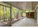 Wide screened patio offers tropical views and ample space for seating and entertaining at 642 N Jefferson Ave # 13, Sarasota, FL 34237