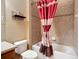 Comfortable bathroom with tiled shower and bathtub, great storage, and decor at 7346 Skybird Rd # 417, Bradenton, FL 34209