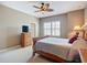 Bedroom featuring bright windows and ceiling fan at 7346 Skybird Rd # 417, Bradenton, FL 34209
