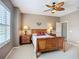 Bedroom with ceiling fan and window, well-lit at 7346 Skybird Rd # 417, Bradenton, FL 34209