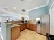 Bright community kitchen featuring stainless steel appliances, granite countertops, and ample cabinet space at 7346 Skybird Rd # 417, Bradenton, FL 34209