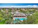 Aerial view of the community pool, clubhouse, and well-manicured grounds of the community at 7346 Skybird Rd # 417, Bradenton, FL 34209