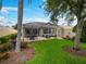 The spacious, grassy backyard is perfect for playing catch at 7641 Quinto Dr, Sarasota, FL 34238