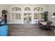 Spacious lounge area with large windows and comfortable seating at 7641 Quinto Dr, Sarasota, FL 34238