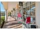 Charming shops with classic architecture and well-maintained landscaping in a pedestrian-friendly Village Walk community at 7641 Quinto Dr, Sarasota, FL 34238
