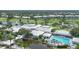 Stunning aerial view of the community clubhouse and outdoor pool area at 802 Montrose Dr # 204, Venice, FL 34293