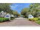 St. Andrews Park entrance featuring brick paved entry and manicured landscaping under a bright blue sky at 802 Montrose Dr # 204, Venice, FL 34293