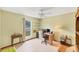 Bedroom used as a home office with tile flooring and natural light at 8160 Glenbrooke Ct, Sarasota, FL 34234