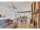 Living room view featuring the fireplace and dining room at 8160 Glenbrooke Ct, Sarasota, FL 34234