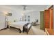 Spacious main bedroom with French doors leading to the pool area at 8160 Glenbrooke Ct, Sarasota, FL 34234