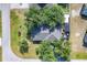Overhead view of home, showing the roof, backyard, landscaping, and neighborhood at 9366 Westminster Ave, Englewood, FL 34224