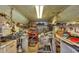 Utility shed featuring shelving and work area for all kinds of projects and storage at 9366 Westminster Ave, Englewood, FL 34224