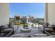 Outdoor balcony with seating and views of the city at 111 S Pineapple Ave # 813, Sarasota, FL 34236