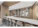 Stylish bar area with ample seating, modern finishes, and a variety of beverages at 111 S Pineapple Ave # 813, Sarasota, FL 34236