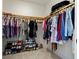 Walk-in closet with organized shelving, hanging rods, and shoe storage at 111 S Pineapple Ave # 813, Sarasota, FL 34236