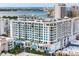 Stunning exterior view of high-rise featuring many balconies and unique art features at 111 S Pineapple Ave # 813, Sarasota, FL 34236