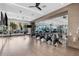 Modern fitness center featuring cardio machines and large mirrored wall at 111 S Pineapple Ave # 813, Sarasota, FL 34236