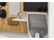 Home office setup features a modern desk, shelving and a wall-mounted monitor setup at 111 S Pineapple Ave # 813, Sarasota, FL 34236