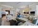 Open-concept living space with a modern kitchen, comfortable seating, and stylish decor, creating a welcoming and functional home at 111 S Pineapple Ave # 813, Sarasota, FL 34236