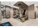 Stylish building lobby featuring comfortable seating, modern lighting, and elegant décor elements at 111 S Pineapple Ave # 813, Sarasota, FL 34236