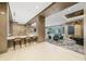 Open lounge area with stylish bar, comfortable seating, and elegant design at 111 S Pineapple Ave # 813, Sarasota, FL 34236