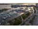 Aerial view featuring a marina with boats and yachts, and parking at 111 S Pineapple Ave # 813, Sarasota, FL 34236