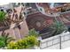 View from balcony, showing brick-paved street below with decorative landscaping at 111 S Pineapple Ave # 813, Sarasota, FL 34236
