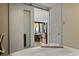 View from bedroom overlooking living area, dining area, and balcony at 111 S Pineapple Ave # 813, Sarasota, FL 34236