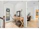 Foyer with decorative console table, tile flooring, and a view into the living area at 13112 Swiftwater Way, Bradenton, FL 34211