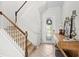Inviting foyer with tile flooring and elegant staircase at 13112 Swiftwater Way, Bradenton, FL 34211