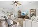 Cozy living room offers ample seating, a large TV, and stylish decor for relaxed living at 13112 Swiftwater Way, Bradenton, FL 34211