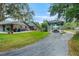 Spacious property features a convenient RV carport and ample parking at 140 Cowpen Ln, Sarasota, FL 34240