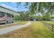 Exterior showing RV cover, barn, and fencing on this large property at 140 Cowpen Ln, Sarasota, FL 34240