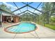 Beautiful screened-in pool and spa area offer a private and luxurious outdoor retreat at 140 Cowpen Ln, Sarasota, FL 34240