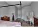 Bedroom featuring a vanity, wood-look floors, and neutral paint at 1542 Ormond Ter, Parrish, FL 34219