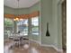 Breakfast nook with large windows overlooking the pool and backyard offers bright eating area at 1542 Ormond Ter, Parrish, FL 34219