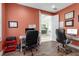 Shared home office space featuring ample workspaces and a neutral decor scheme at 1542 Ormond Ter, Parrish, FL 34219