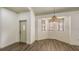 Inviting entryway with wood-look floors and large window at 203 28Th W St, Palmetto, FL 34221