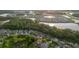 Stunning aerial view of a community with beautiful homes surrounding serene lakes and lush green spaces at 20316 Natures Corner Dr, Tampa, FL 33647