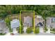 Aerial view of a home with a spacious backyard, near a pool and surrounded by trees at 20316 Natures Corner Dr, Tampa, FL 33647
