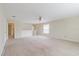 Large carpeted bedroom with ceiling fan at 20316 Natures Corner Dr, Tampa, FL 33647