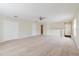 Large carpeted bedroom with ceiling fan and closet at 20316 Natures Corner Dr, Tampa, FL 33647