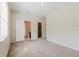 Bedroom with carpeted floor and an attached bathroom and closet at 20316 Natures Corner Dr, Tampa, FL 33647