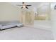 Spacious living room with neutral walls, tile floors and modern ceiling fan at 20316 Natures Corner Dr, Tampa, FL 33647